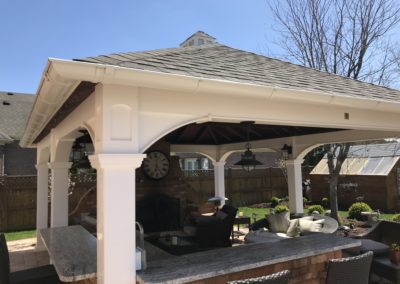 White gutters on a beautiful pool bar.