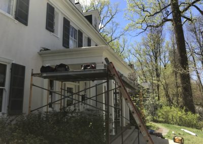 White gutters on a nice porch. Beautiful house.
