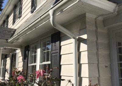 Half round gutters and round downspouts